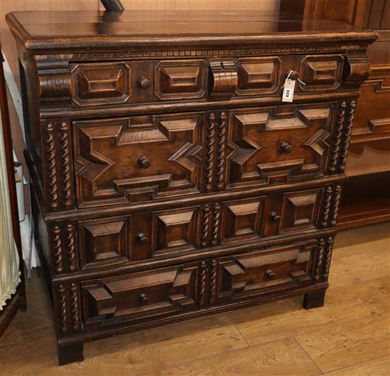 A 17th century style oak chest of drawers W.110cm